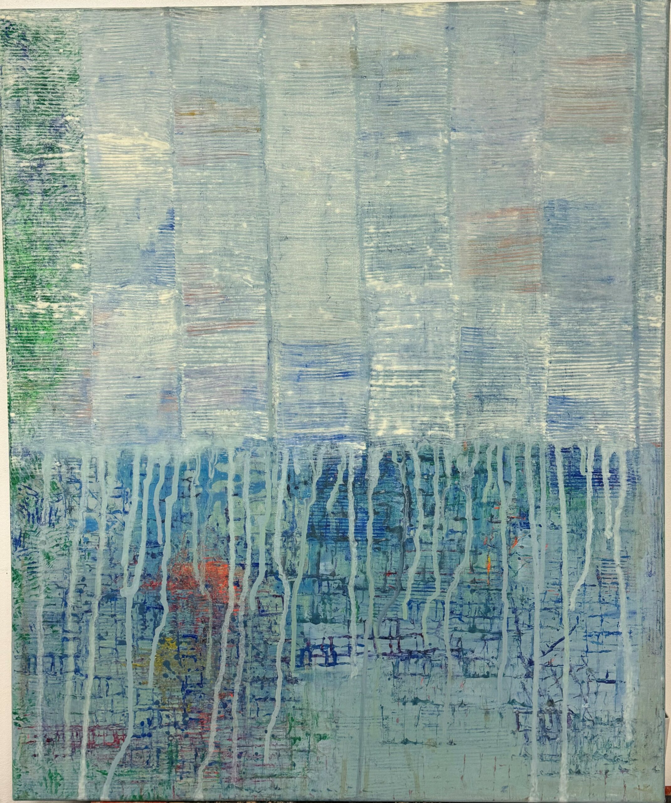 A travers la fenêtre sous la pluie